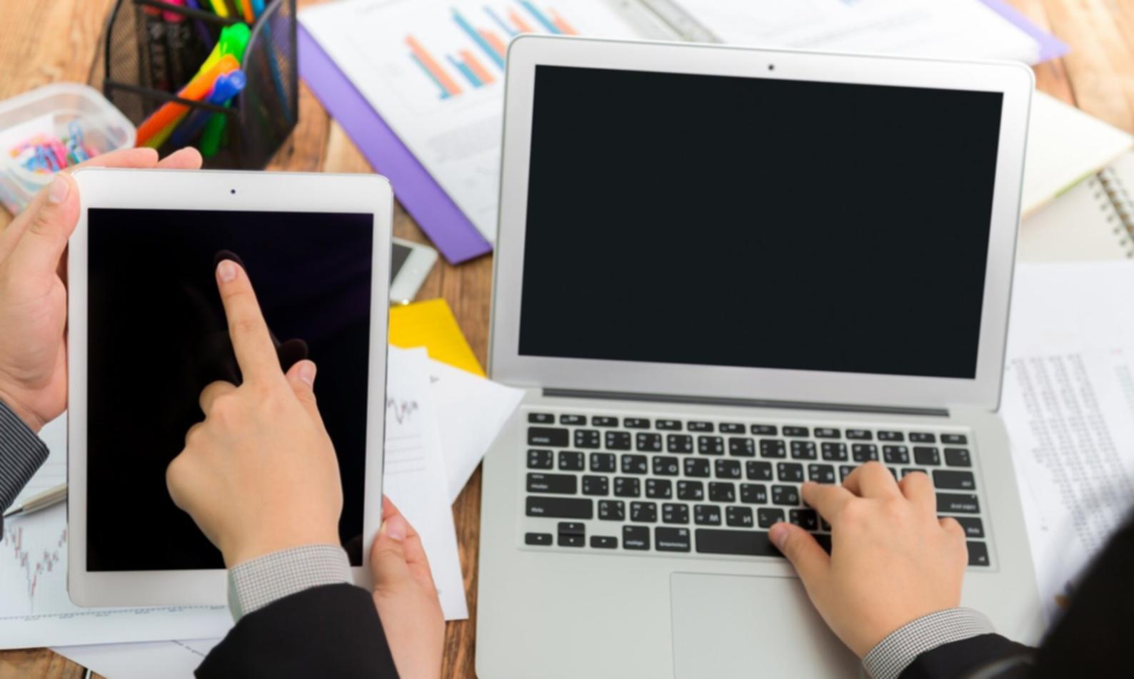 Finance team reviewing budget analysis and discussing strategic implications during case study session